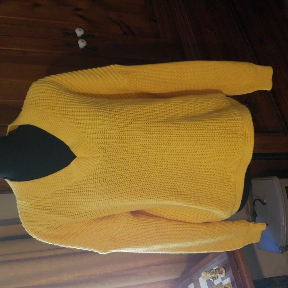 Bright yellow sweater